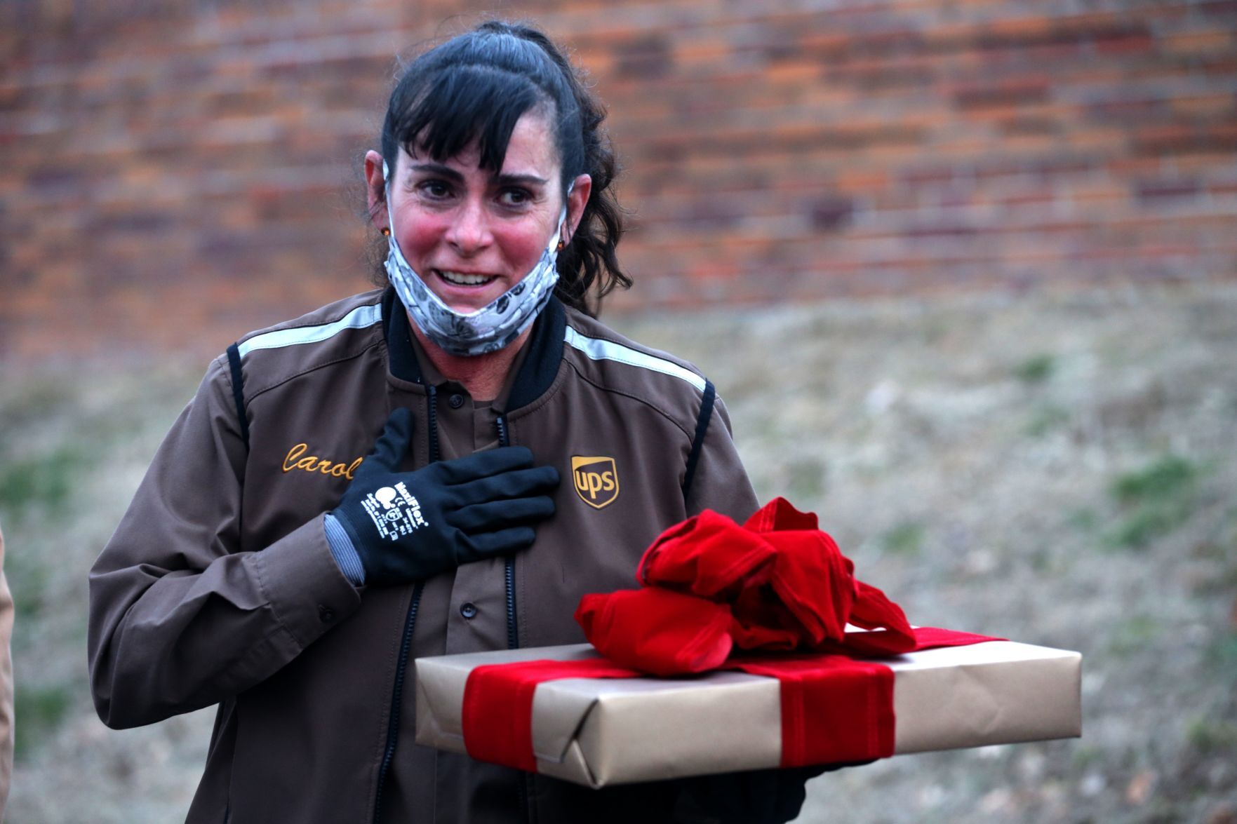 Grateful customers surprise their UPS route driver with a new roof